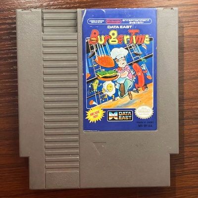 A cartridge for the Nintendo Entertainment System game, “BurgerTime”.